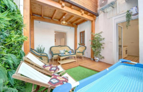 Apartment with pool by the beach